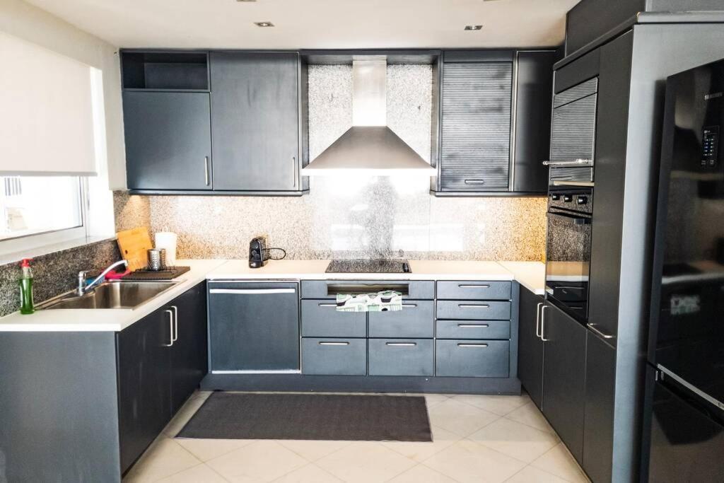 1, Kotzia Str. & Poseidonos Avenue, Alimos * Athens